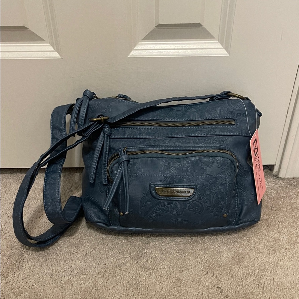 Stone Mountain Accessories Blue Embossed Crossbody Bag